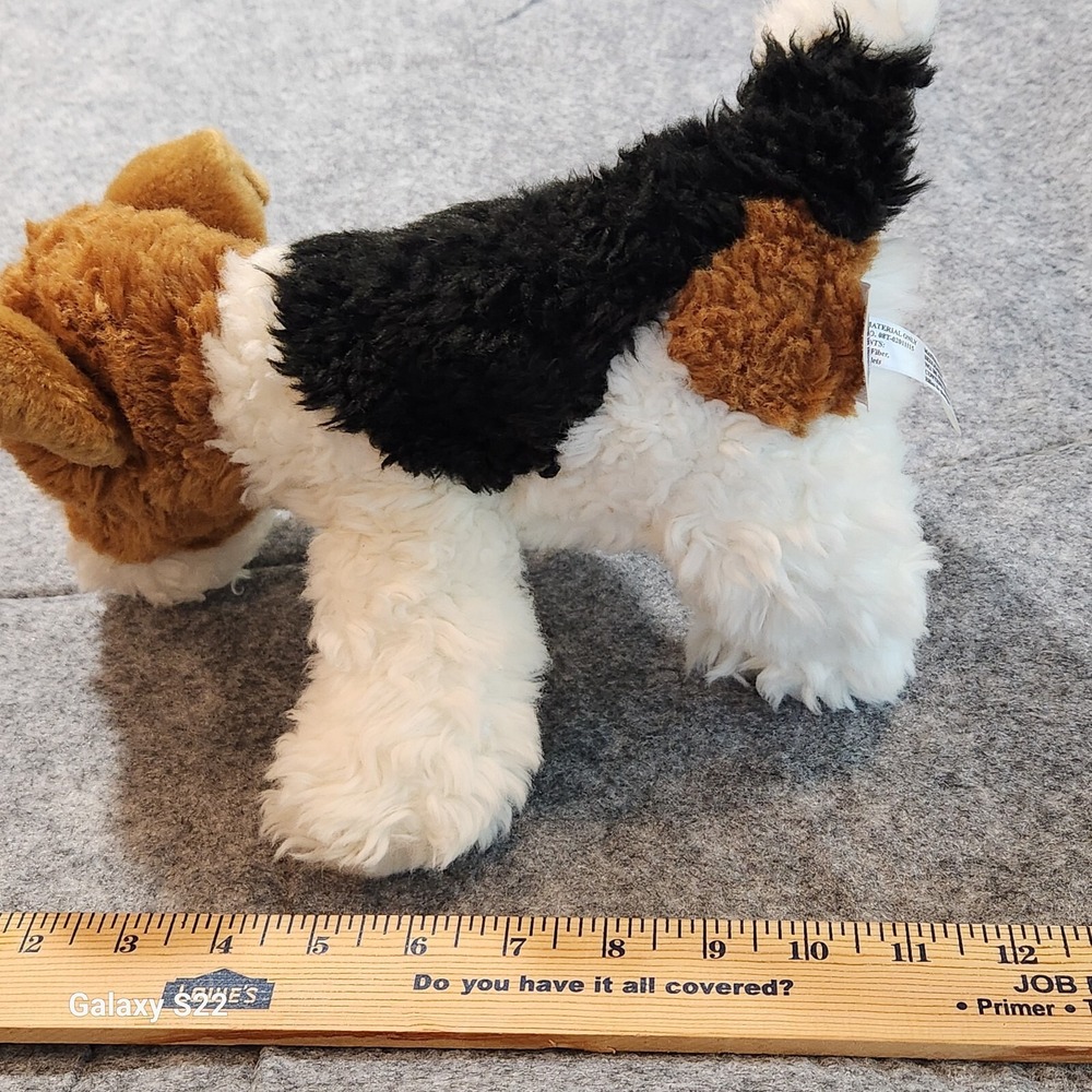 Hands on a Ganz Plush Dog Tricolor Terrier Stuffed Animal White Brown Black - Picture 10 of 11